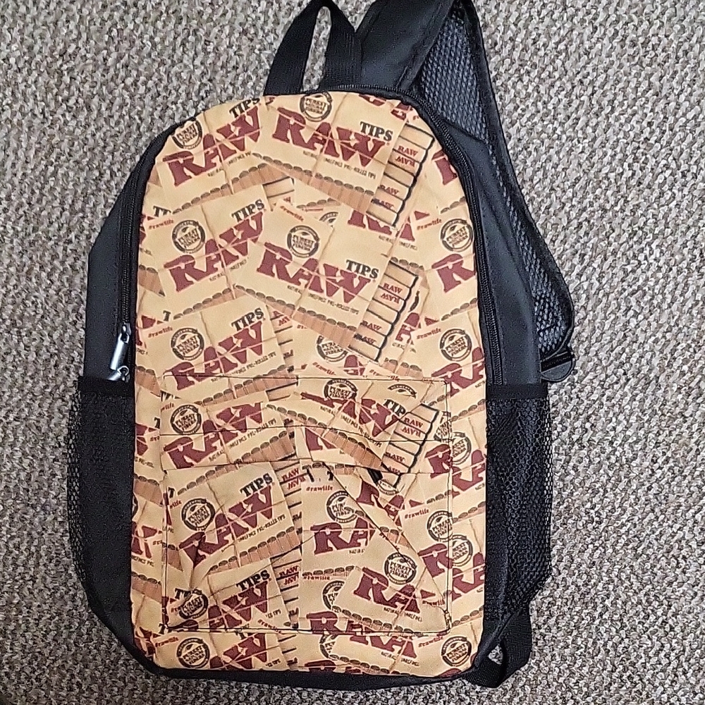Tan and Black Raw Backpack